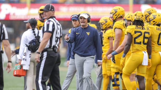 Sep 23, 2023; Morgantown, West Virginia, USA; West Virginia Mountaineers head coach Neal Brown argues a call during the first quarter against the Texas Tech Red Raiders at Mountaineer Field at Milan Puskar Stadium. Mandatory Credit: Ben Queen-USA TODAY Sports